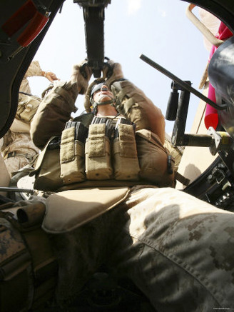 A Marine Rocks His M-2 50-Caliber Machine Gun at Camp Fallujah's Eagle Range