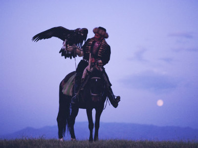 Kalanash Sarsembek with Eagle, a Hunter's Moonrise Over Steppe, Kazakhstan, Central Asia